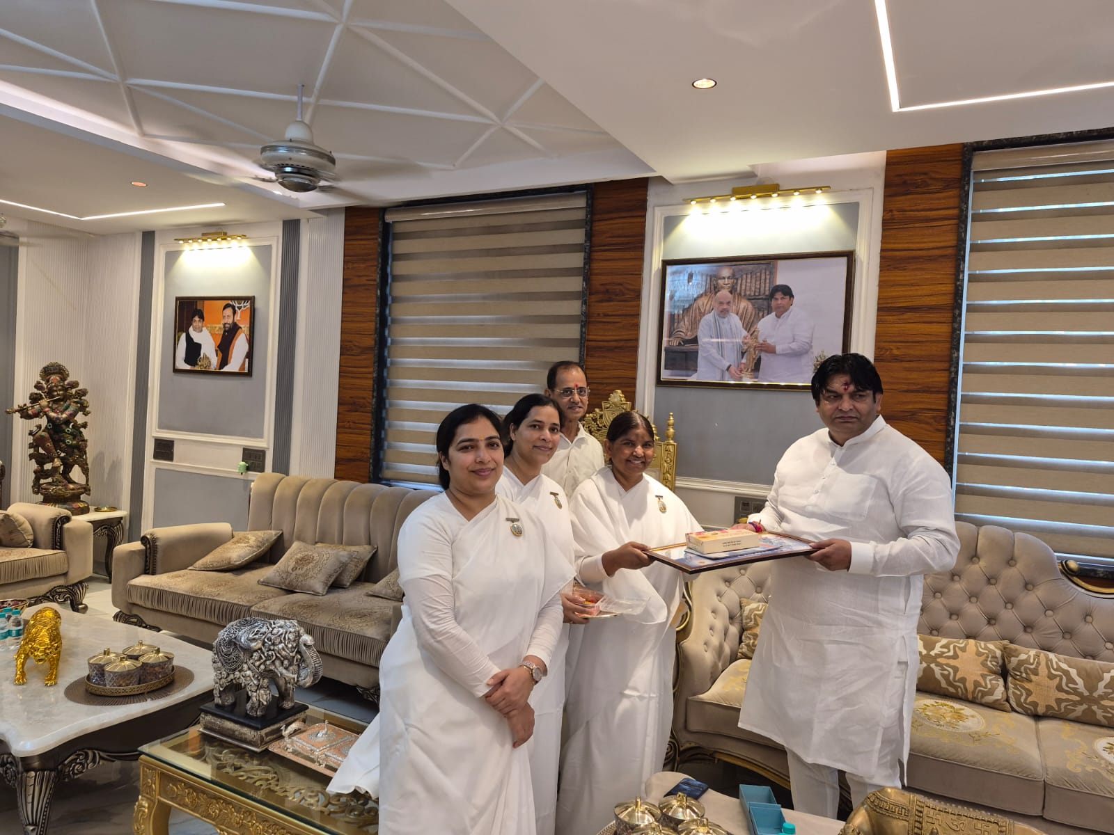 BK Kusum Didi tying sacred Rakhi to Gurugram MLA Mukesh Sharma and police officials
